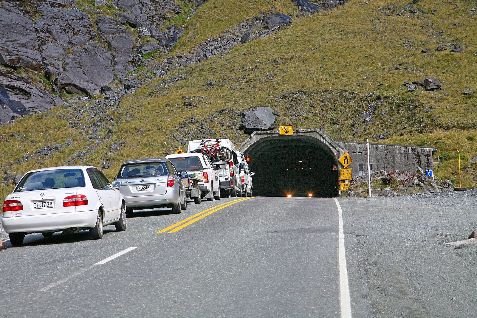 Milford Road — The Homer Tunnel — one lane, hand-cut through the mountain